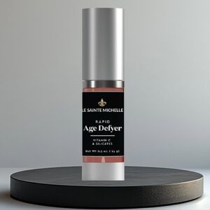 Elegant Black Eye Cream with Pump Dispenser and Gold Accents